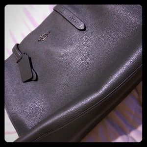 Coach Charlie Carryall